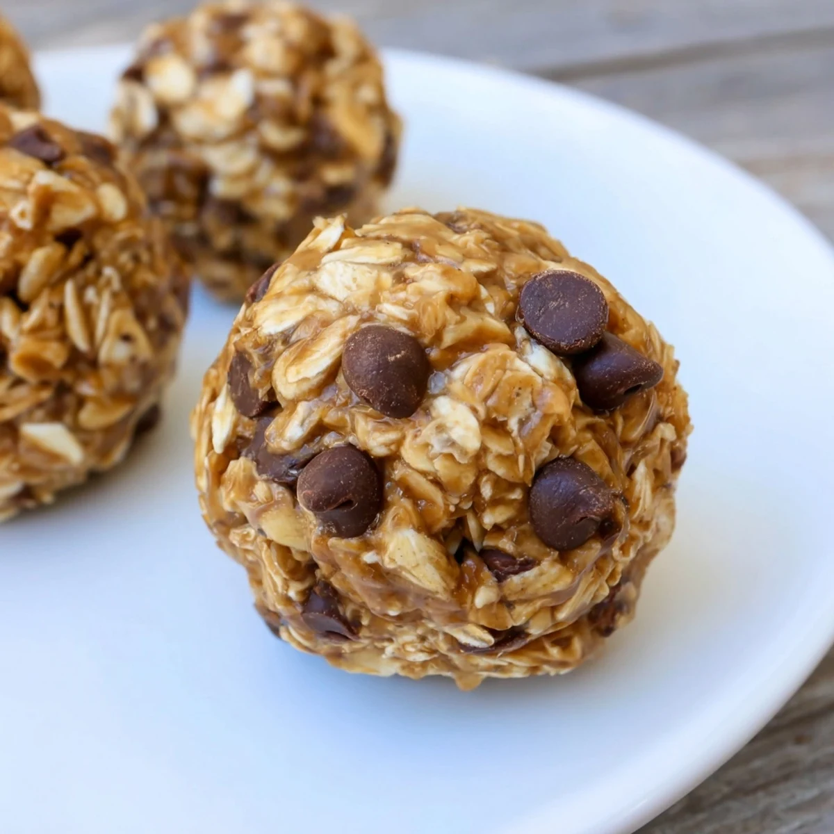 No-Bake Peanut Butter Energy Balls, beautifully textured, studded with chocolate chips, ready to eat.