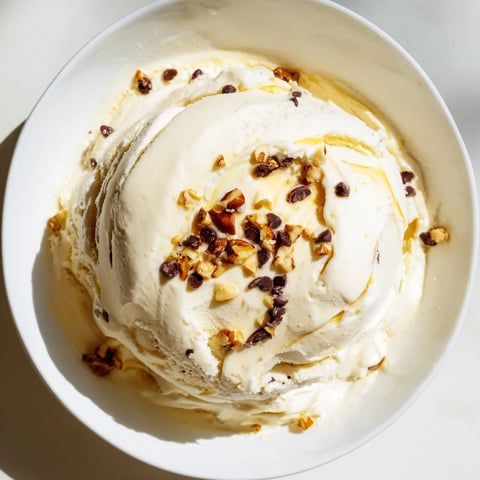 Creamy cottage cheese ice cream with fresh berries, a delightful, protein-packed homemade dessert.