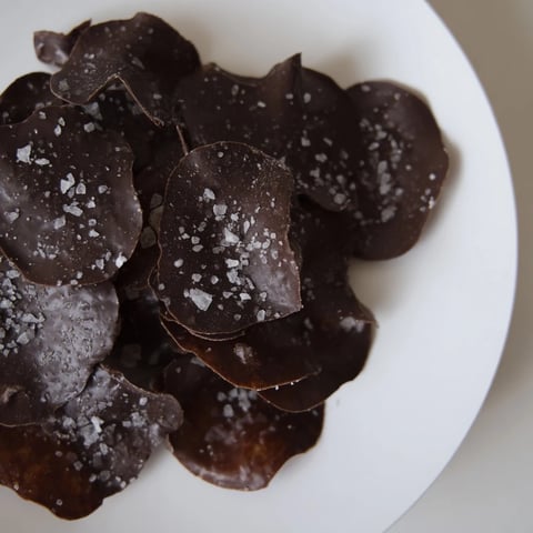 Crunchy, speckled Chocolate Potato Chip Bark glistening with sea salt, a perfect dessert recipe.