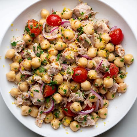 Flaky tuna and chunky chickpeas make this satisfying Dense Chickpea and Tuna Salad delicious.