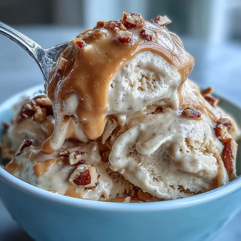 Creamy 4-Ingredient Peanut Butter Banana Ice Cream, a dairy-free dream topping any dessert.