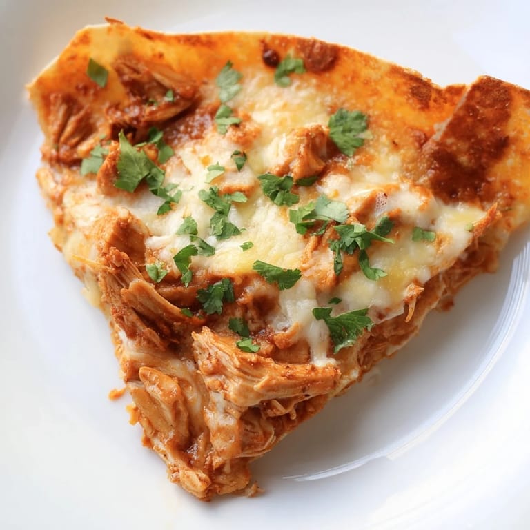 Crispy flour tortillas enclose savory butter chicken filling and gooey cheese in these irresistible quesadillas.