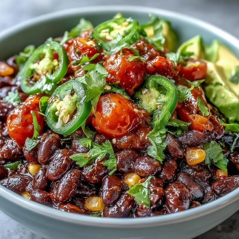Enjoy this easy plant-based taco bowl, complete with zesty salsa and fluffy rice.